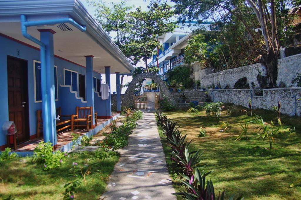 Blue Corals Beach Resort Малапаскуа Айлънд Екстериор снимка