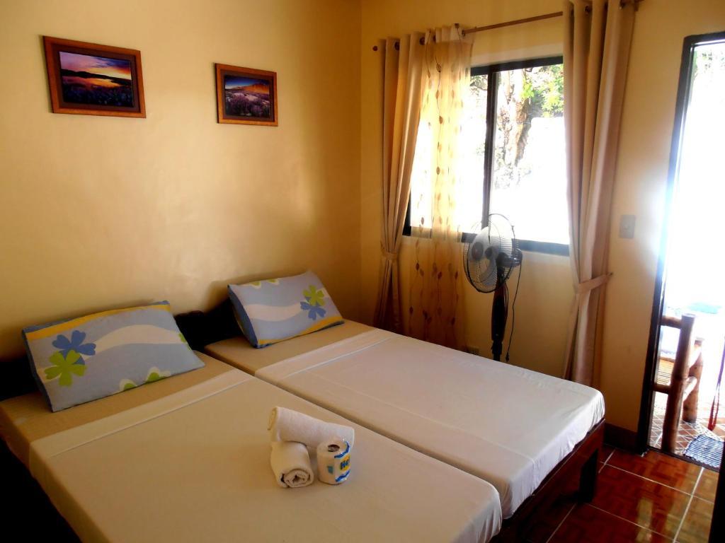 Blue Corals Beach Resort Малапаскуа Айлънд Екстериор снимка